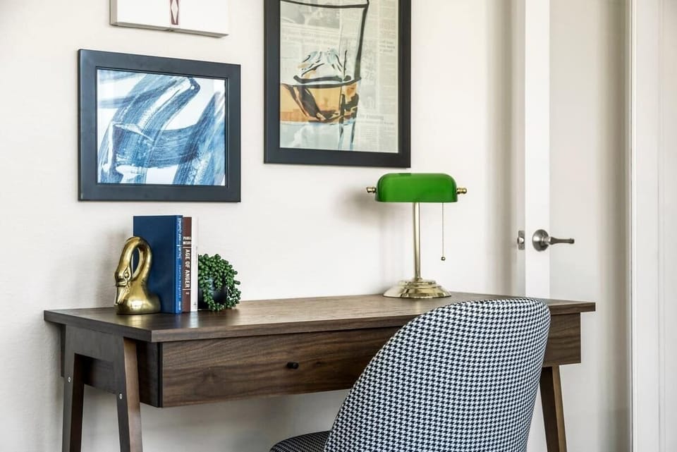 Office has a desk and chair