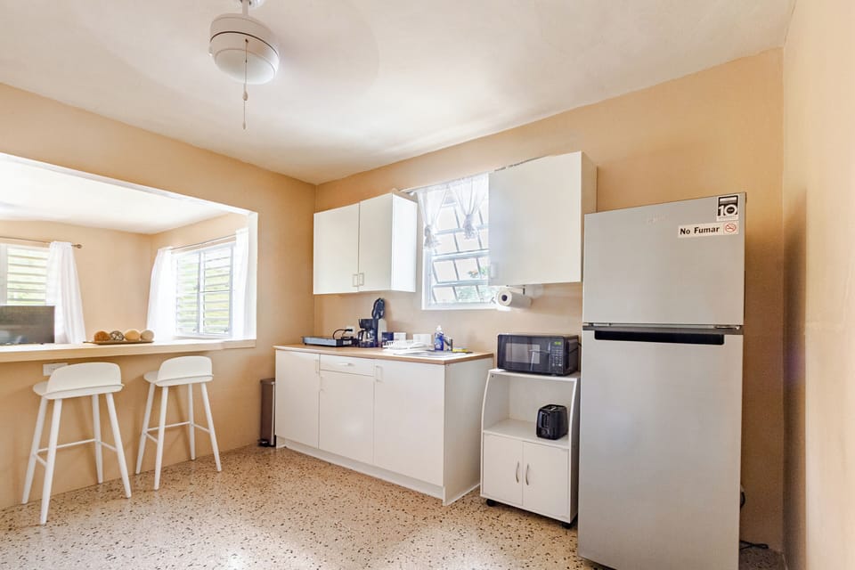 Kitchenette: Stove top 2 burner, coffee pot, microwave, refrigerator, toaster