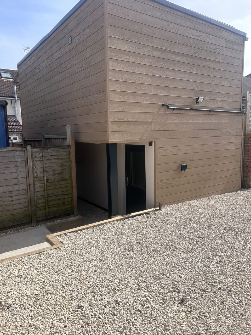side with parking area