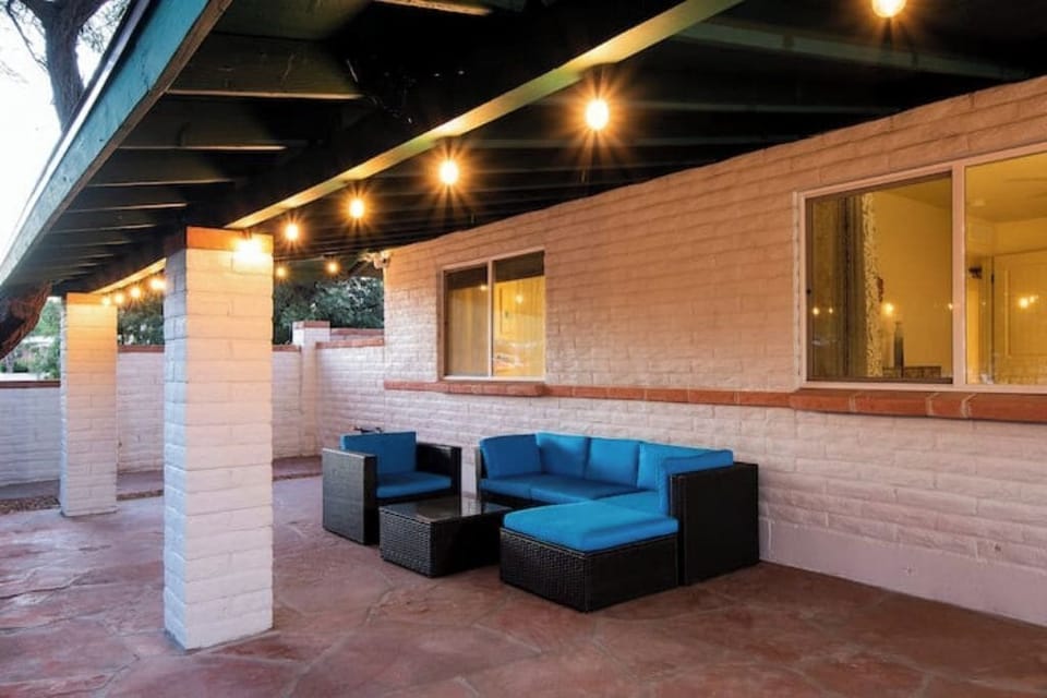 Comfy outdoor furniture on the covered patio.