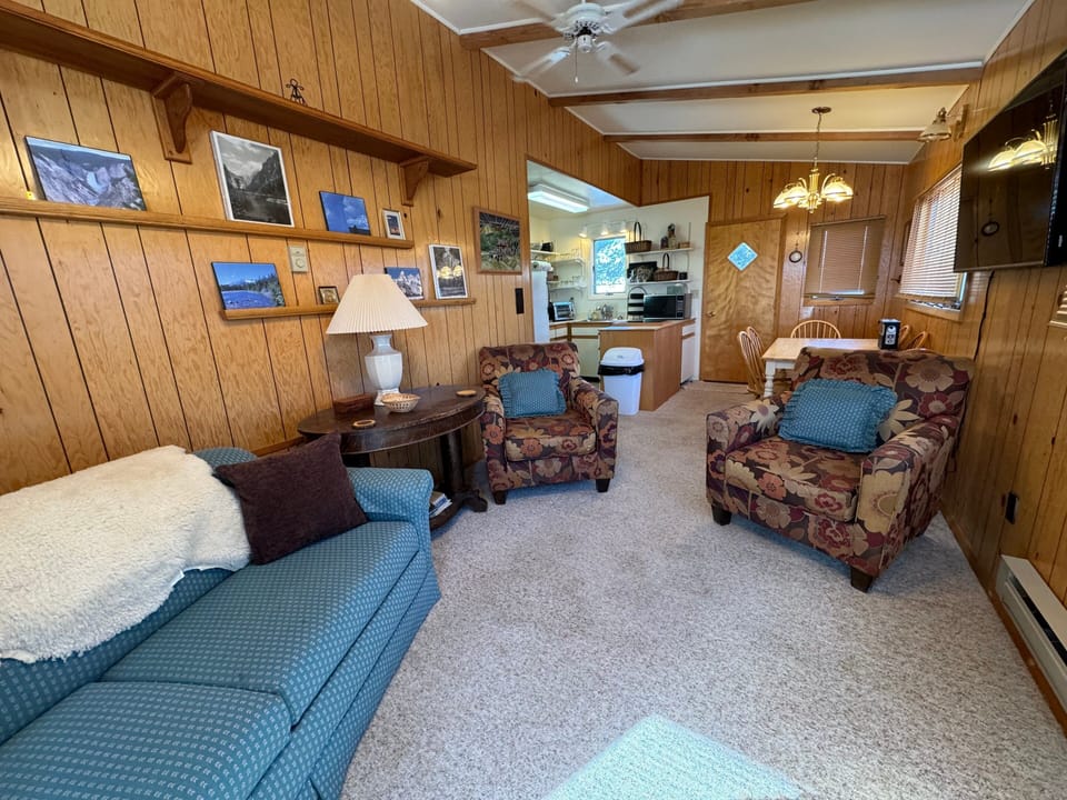 Open living, dining and kitchen area.