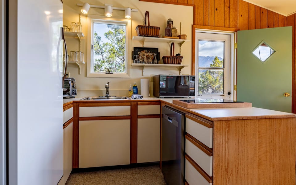 The kitchen has modern appliances to make preparing meals a pleasure.