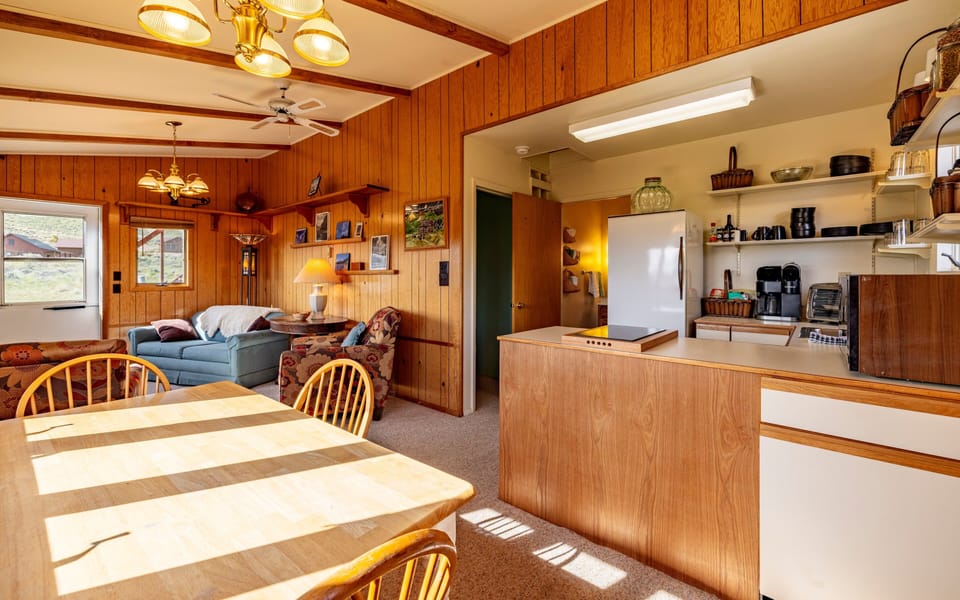 Bright dining room is a great place to gather for meals.