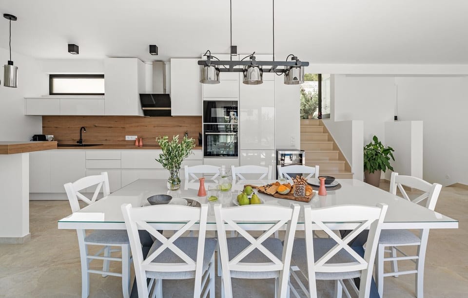 Spacious dining area for 8 pax filled with natural light
