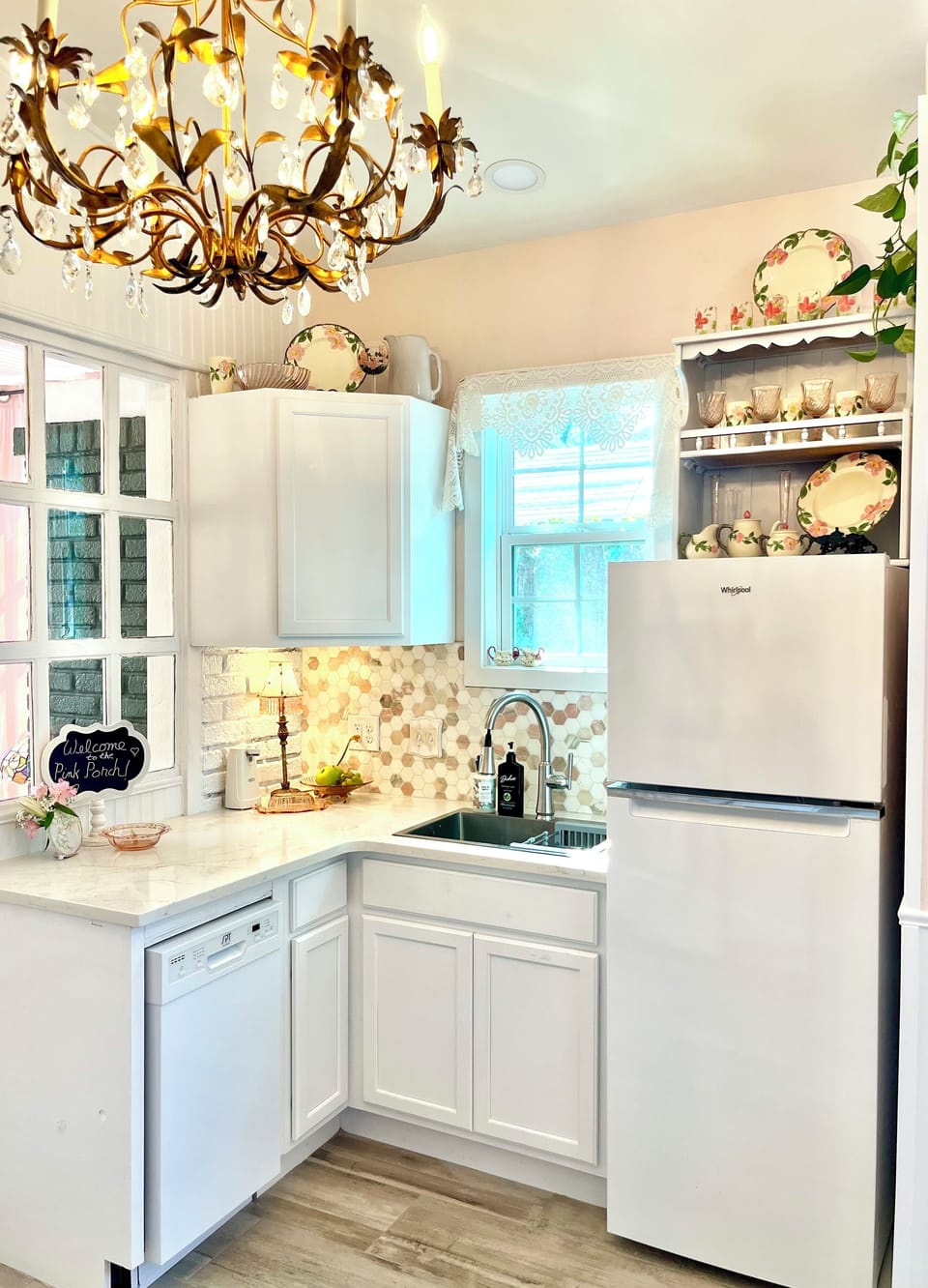 Norwegian marble tile kitchen backsplash, crystal chandelier, full size frig