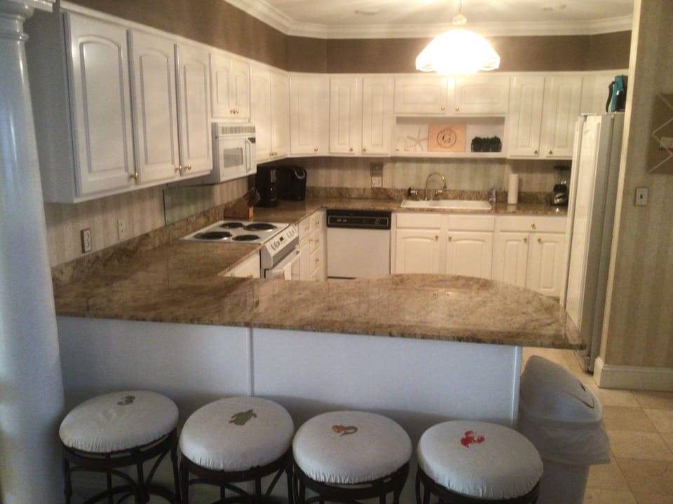 Spacious kitchen with toaster oven, air fryer, Keurig coffee maker.