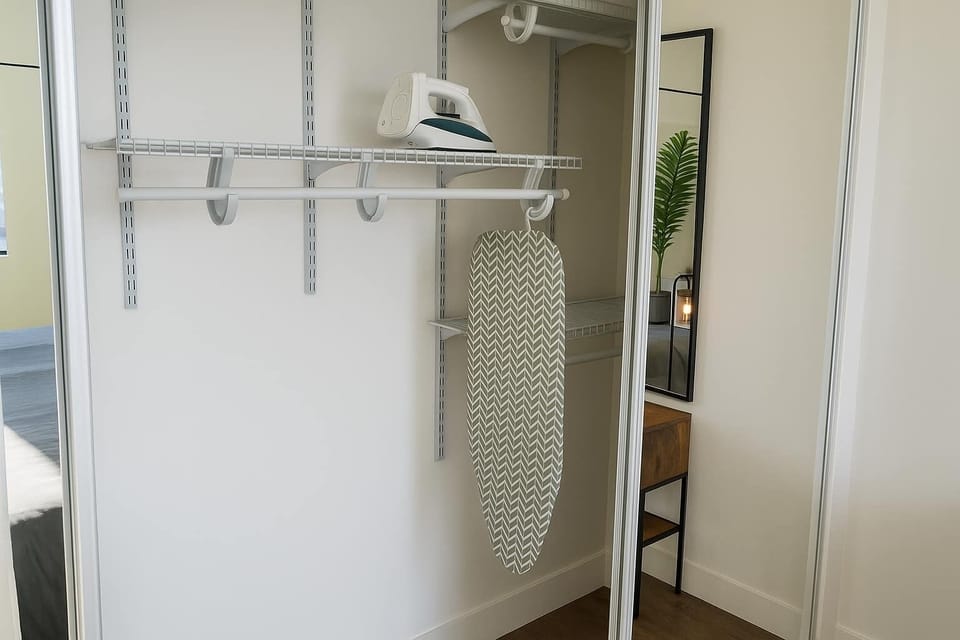 Spacious closet stocked with extra sheets, towels, pillows, and an ironing board for your convenience.