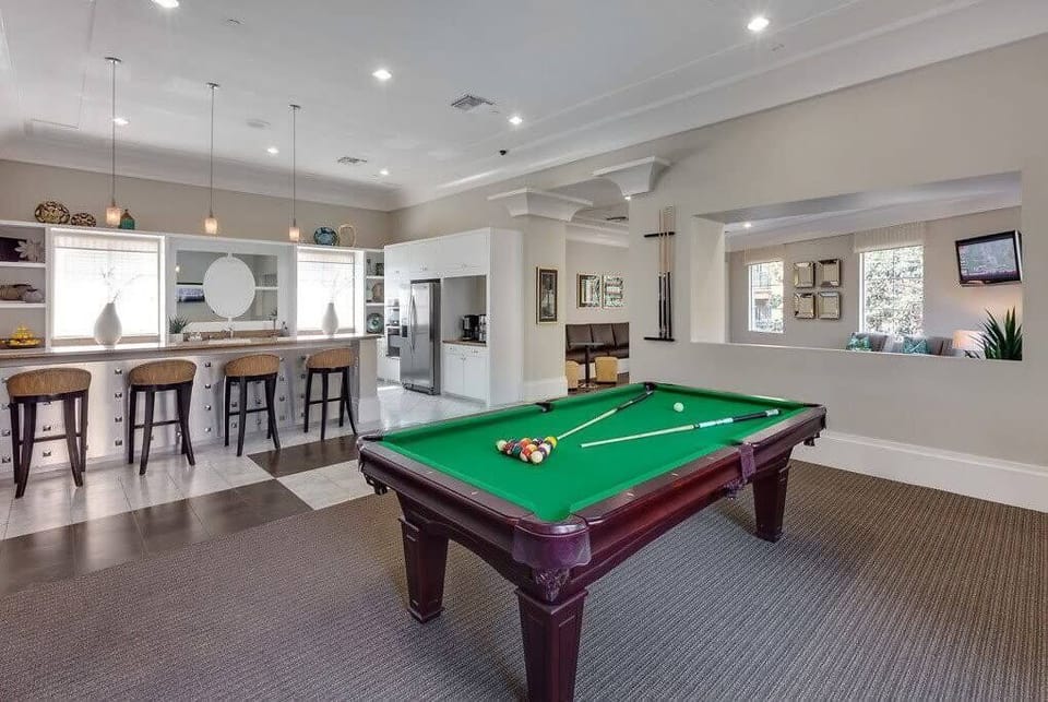 Enjoy quality family moments with our clubhouse pool table—a perfect spot for fun and laughter!