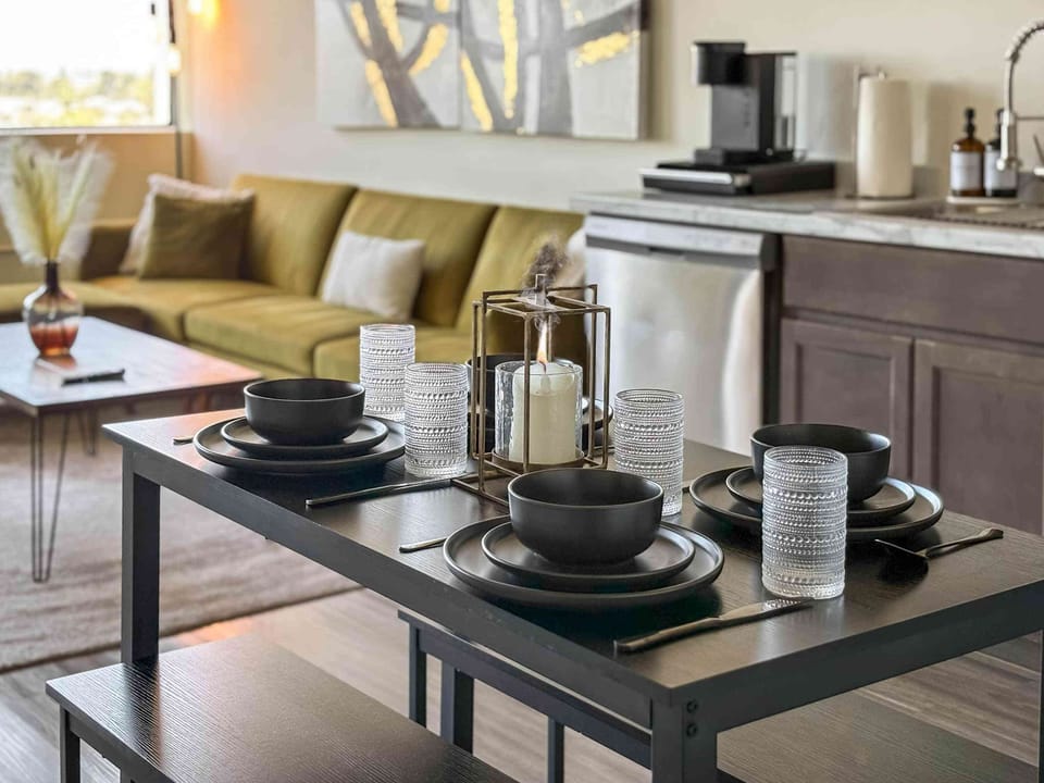Charming dining area: Seats 4, includes full dinnerware set.