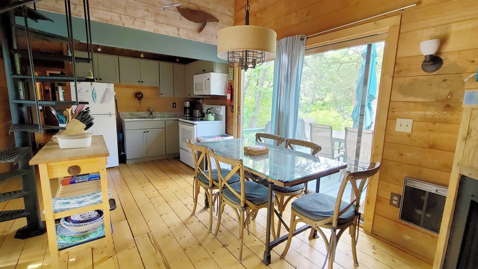 Dining area with slider to back deck