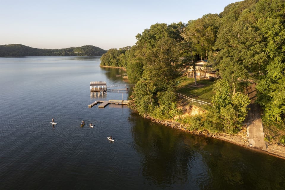 Private boat dock to the left.  Private boat launch and beach for swimming to the right.  300' directly on Kentucky Lake.