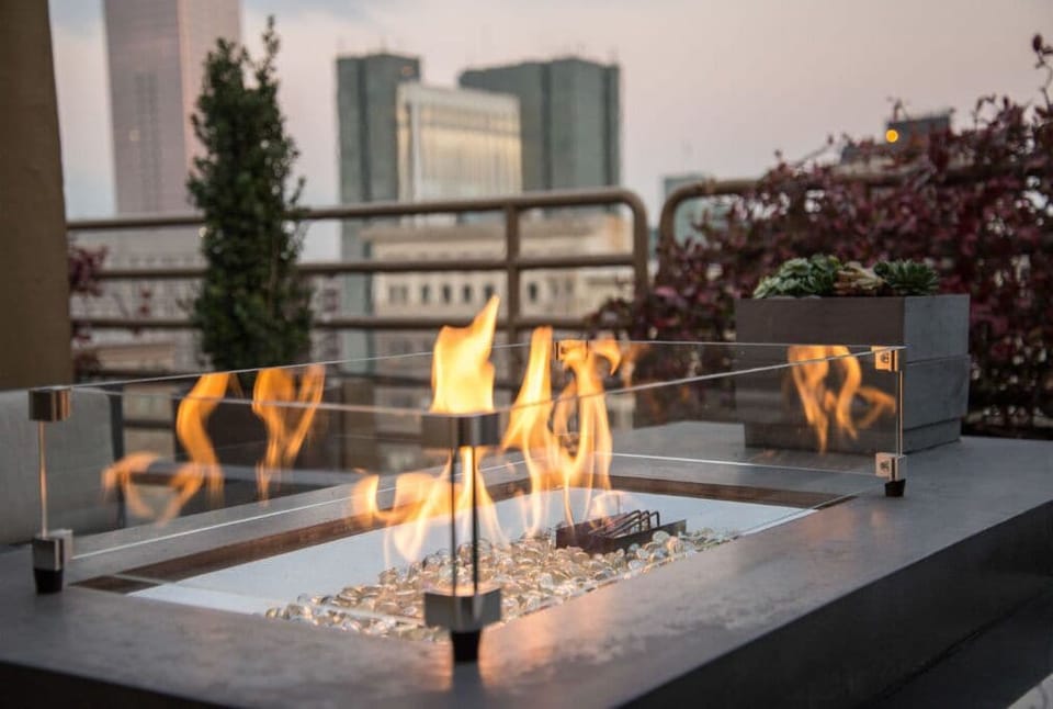 Warm up by the cozy outdoor fire pit, ideal for enjoying evenings.