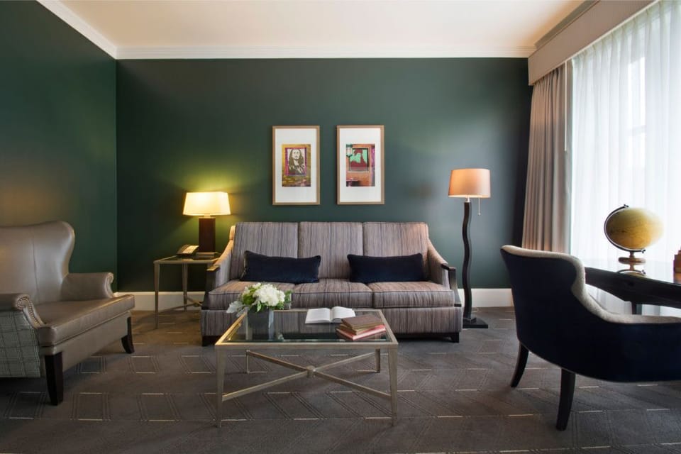Relax in the spacious living area with comfortable seating, elegant furnishings, and a serene atmosphere.