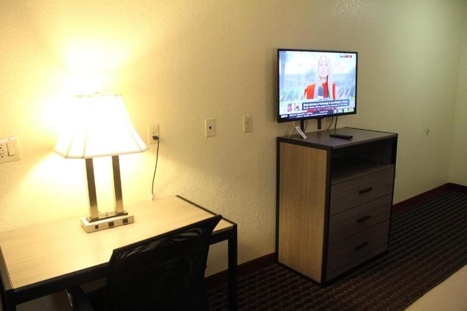 Catch up on work with a lamp-lit desk and snacks.