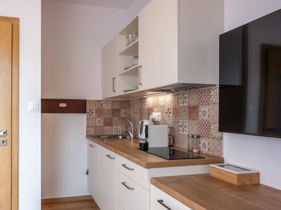 Cabinetry, Property, Countertop, Wood, Drawer, Interior Design, Lighting, Architecture, Floor, Flooring