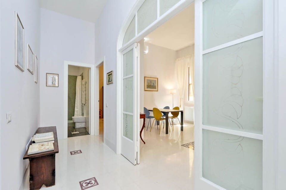 Hallway to living area and bedroom