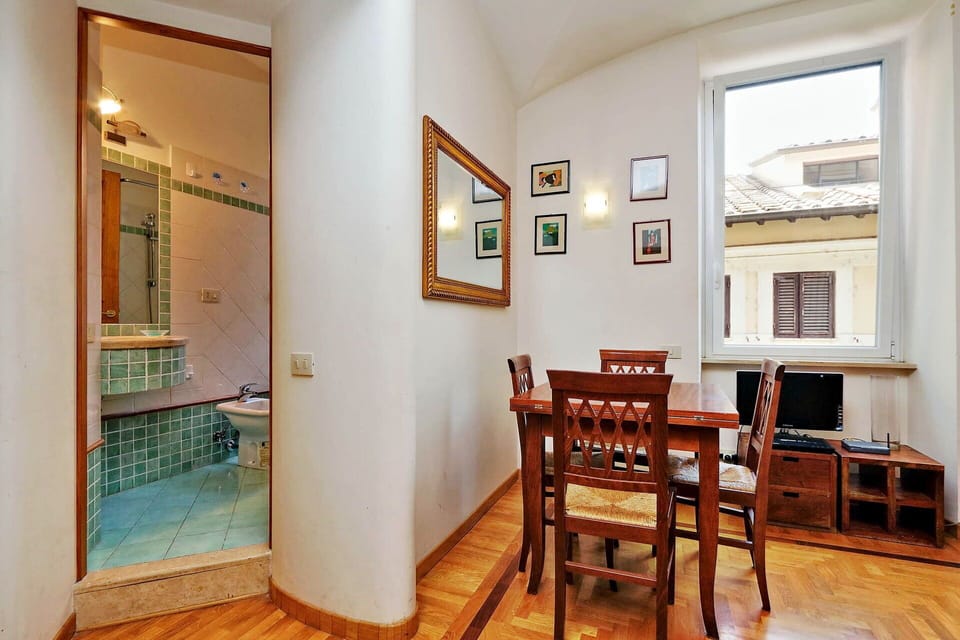 Entrance to bathroom and dining area.