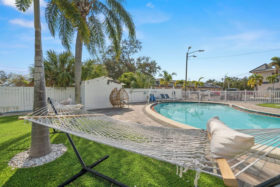 Spacious pool deck with plenty of seating options.
