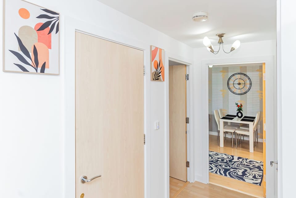 Inviting hallway leading to the dining area, creating a seamless flow between spaces and enhancing the sense of openness and comfort.