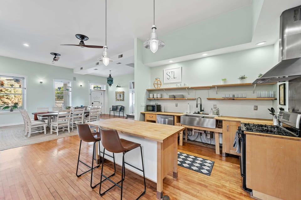 Elevate your culinary skills in a modern kitchen setup complete with a convenient center island and a high-performance stove top oven. 🌟🔪 #CookingPassion