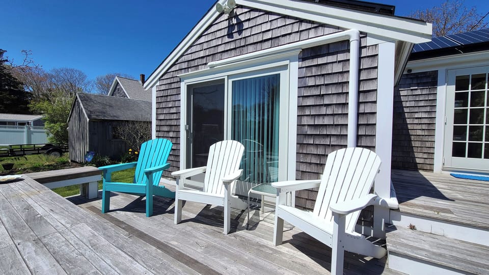 Relax and unwind in the Adirondack chairs on the deck