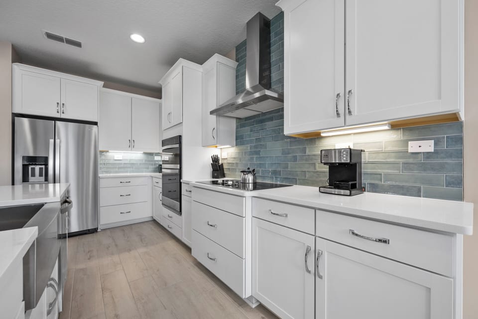 Kitchen with full coffee, espresso, and cappuccino bar