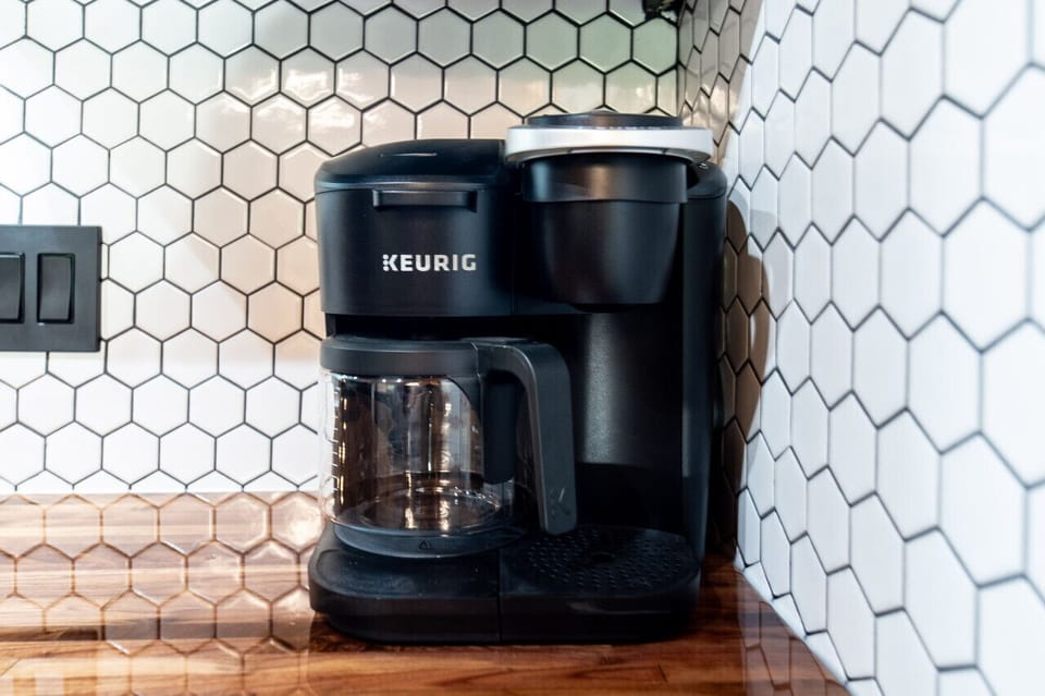 Start your mornings with a fresh brew using our Keurig coffee maker—pods included!