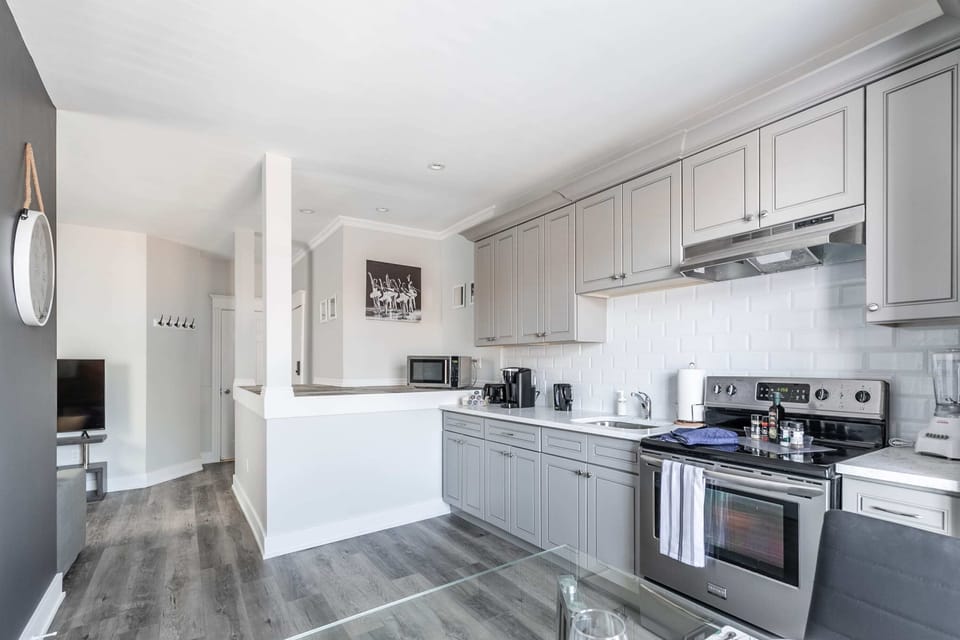 Bright And Functional Cooking Space Seamlessly Connected To The Living Area