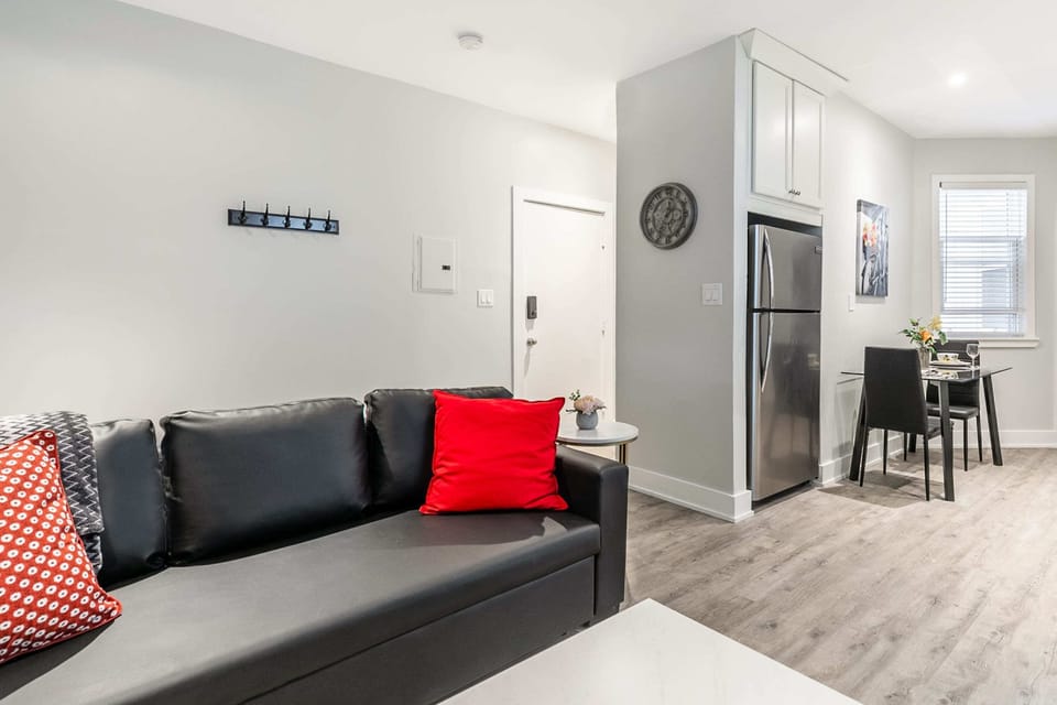 Unwind On The Comfortable Sofa In This Stylish Space