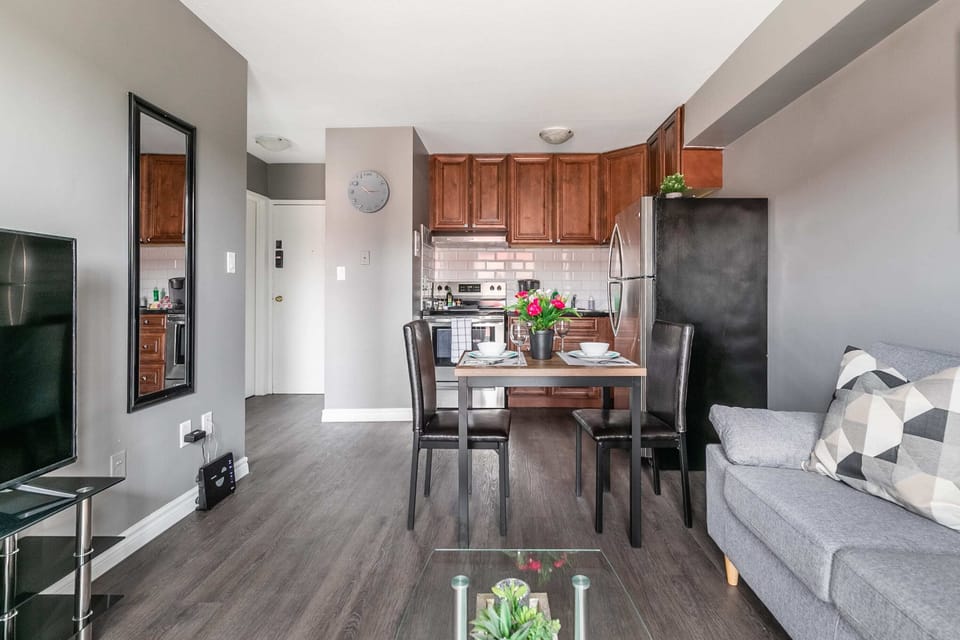 Stylish Kitchen And Dining Setup With Elegant Finishes