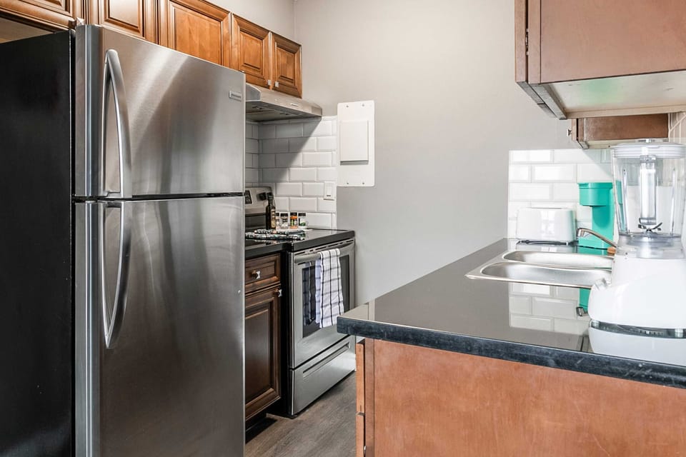 Fully Equipped Kitchen With Modern Stainless Steel Appliances