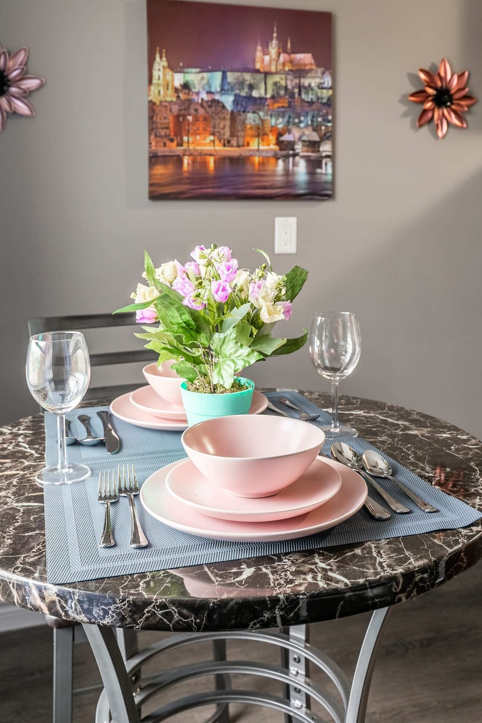 Elegantly Set Dining Table With Floral Centerpiece