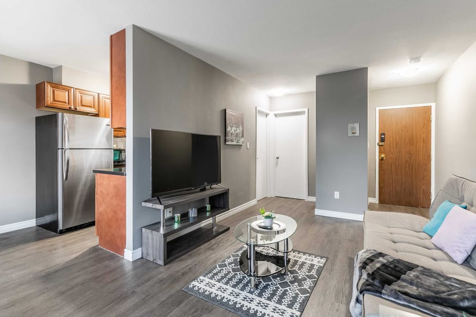 Modern Living Area With Smart TV And Elegant Furniture