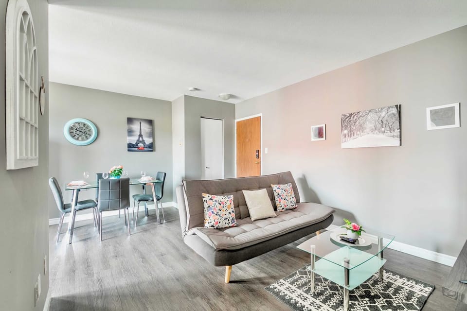 Stylish Living Area With A Sofa Bed And Dining Space