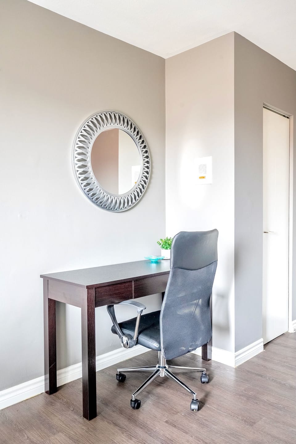 Functional Workspace With A Sleek Desk And Comfortable Chair