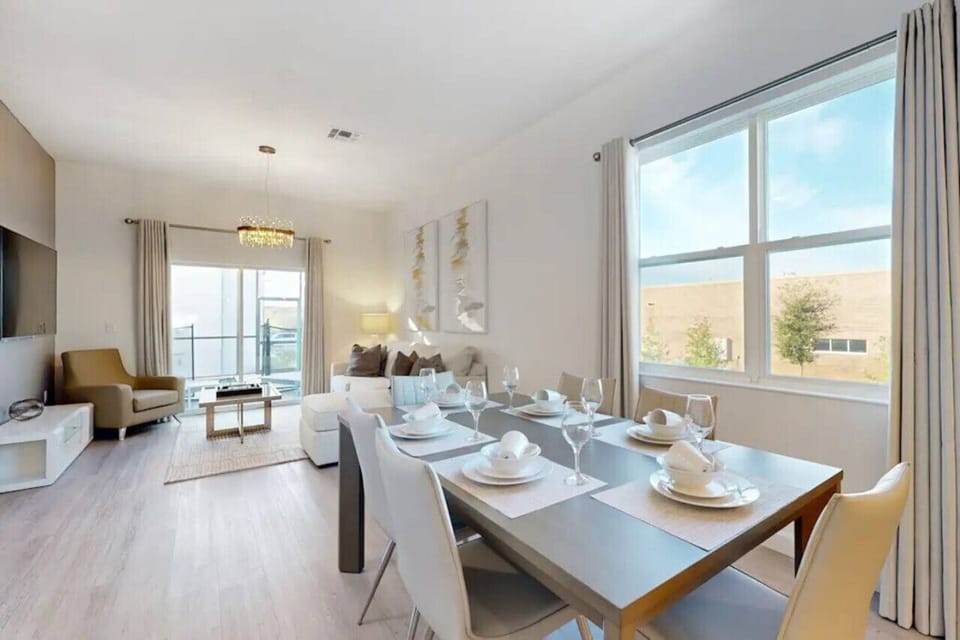 Relax in style with this living room, complete with a plush couch- and a sleek smart TV