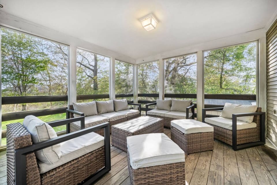 Screened in porch that is magical in the summer. Perfect for early morning coffee or late night wine.