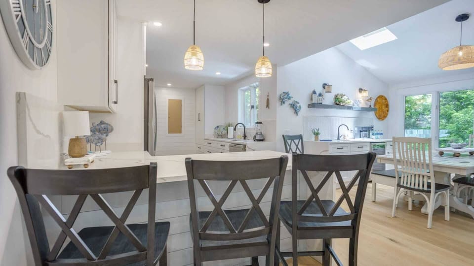 Luxury meets convenience. Indulge in the spaciousness and elegance of our updated kitchen, ideal for cooking, dining, and socializing.