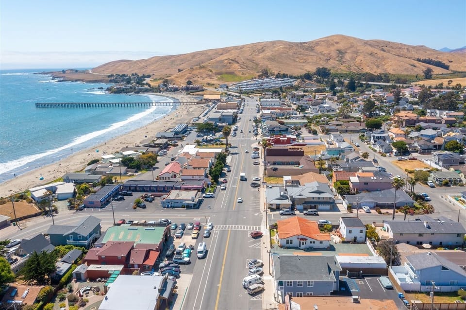 This incredible property is a short walk to downtown or the beach