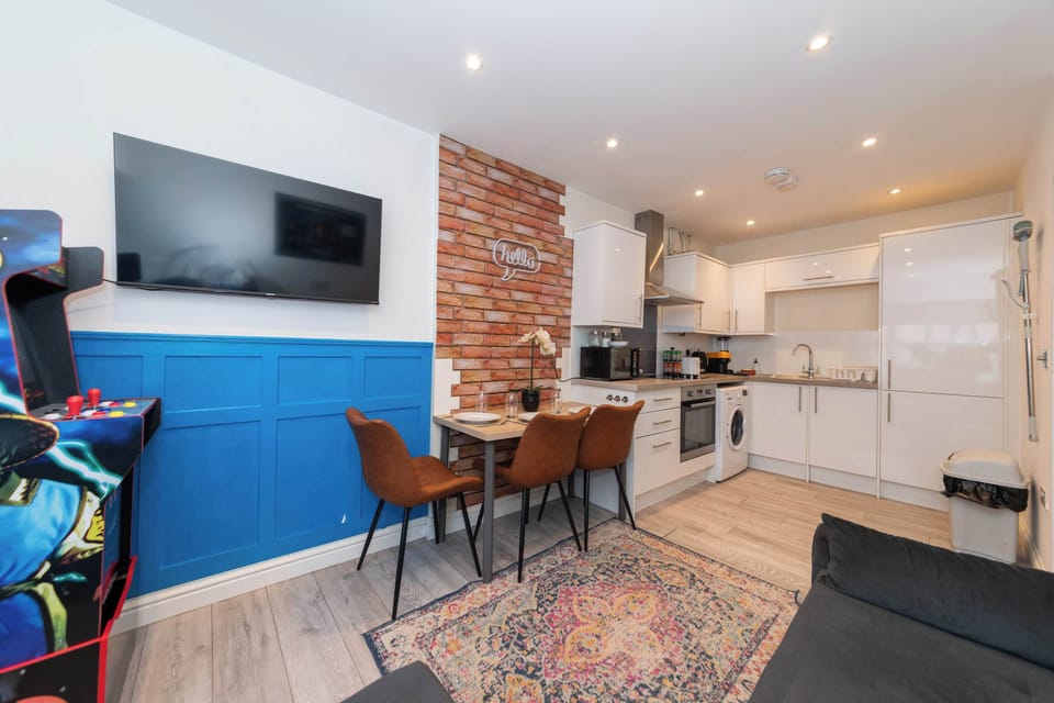 The full picture. Living, dining and kitchen all in one open layout. Room to breathe, room to live.