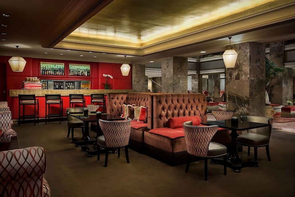 Sip cocktails at the stylish bar before heading out.