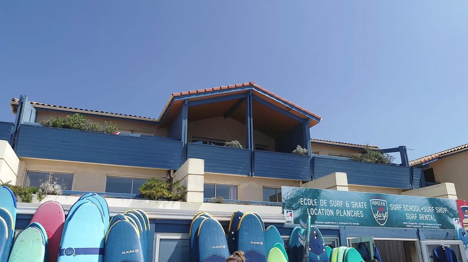You will find many surf schools and watersports rental nearby.