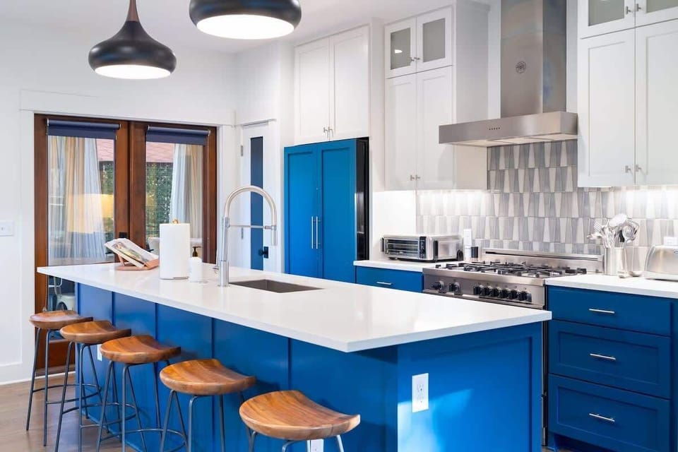 A modern kitchen perfect for home-cooked meals or conversations over snacks!