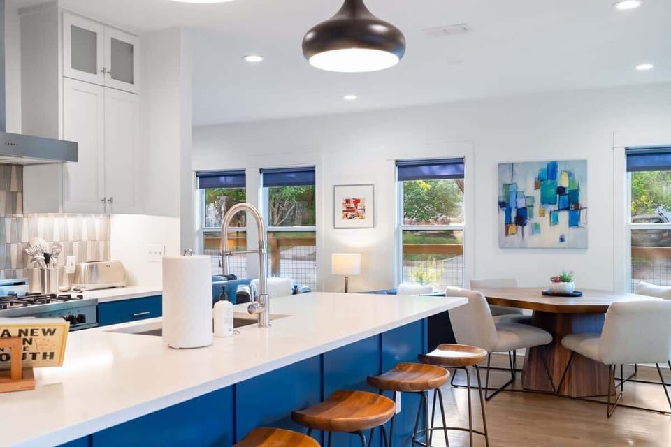 A modern kitchen perfect for home-cooked meals or conversations over snacks!