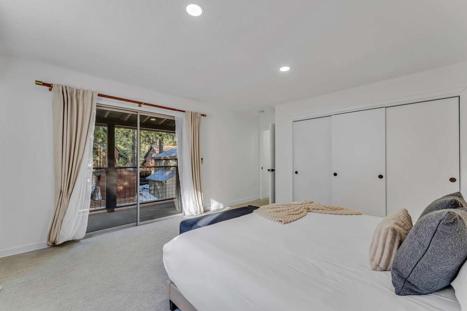 Bedroom 5: King bed, upper level, nightstand, closet, patio access