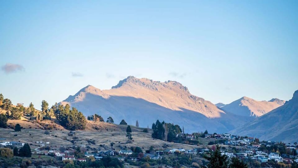 Take in the serene lake and mountain views from your own balcony, complete with a stylish seating area for ultimate relaxation and enjoyment.
