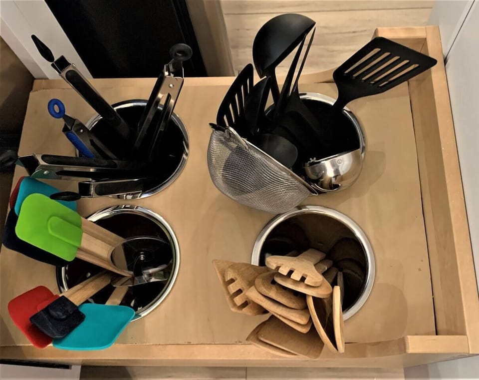 A well-equipped kitchen, featuring a commercial gas range, comes fully stocked with all the essential cooking tools and utensils, ensuring you can whip up gourmet meals throughout your entire stay.