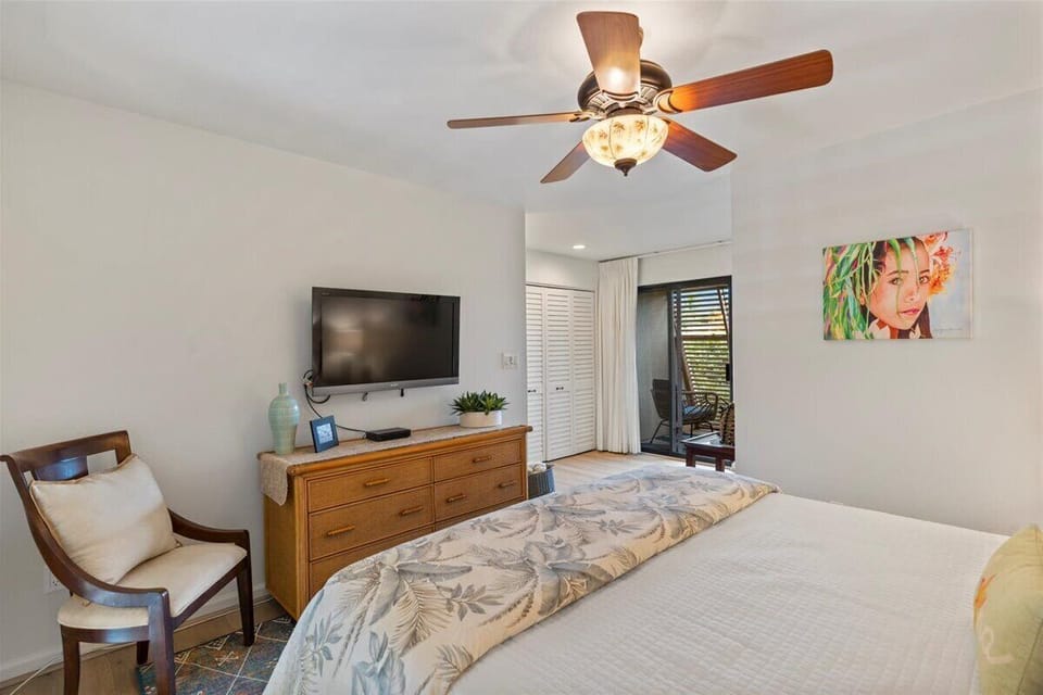There is a wall AC unit in the bedroom