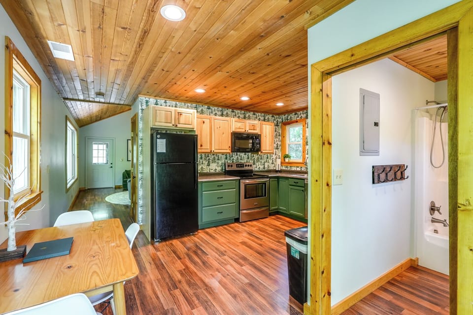 The bathroom is off the dining area.