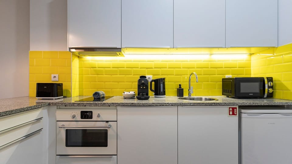 Our kitchenette is fully equipped with high-end appliances #modern #home